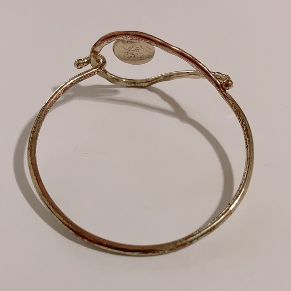 Gold tone bangle bracelet with eye - Picture 2 of 3